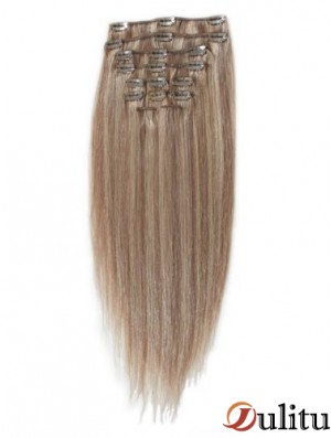 Grande pince à cheveux remy blonde droite dans les extensions de cheveux