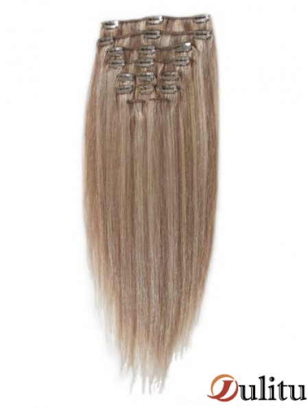 Grande pince à cheveux remy blonde droite dans les extensions de cheveux