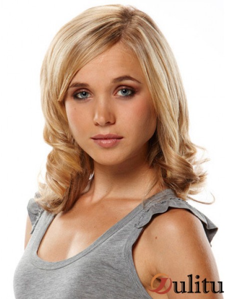 Grande pince à cheveux bouclée blonde remy dans les extensions de cheveux